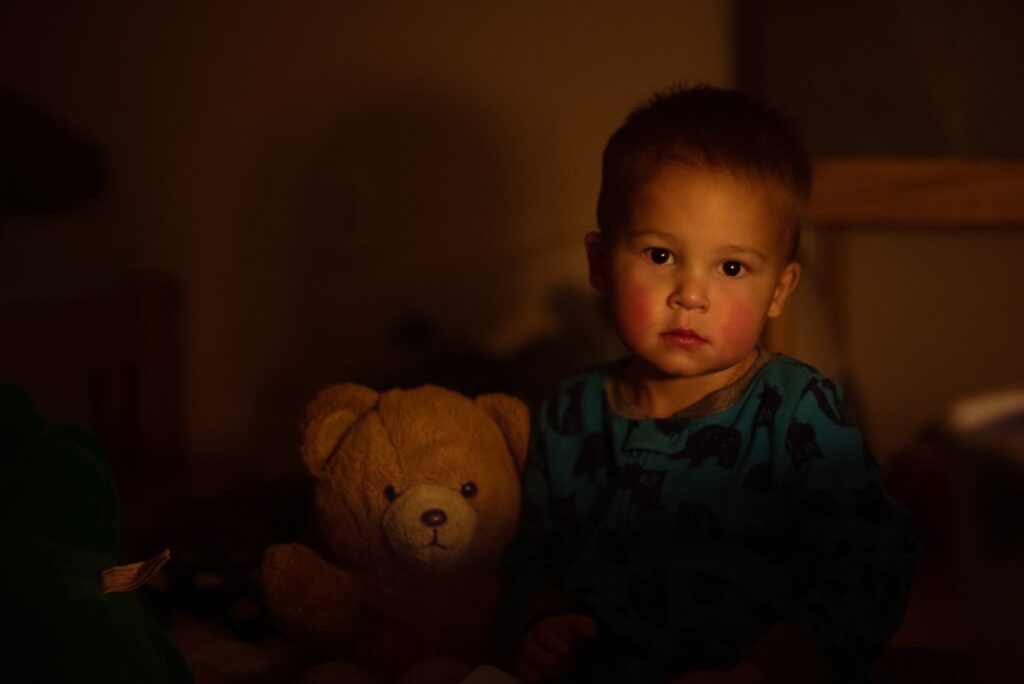 Toddler with his teddy bear