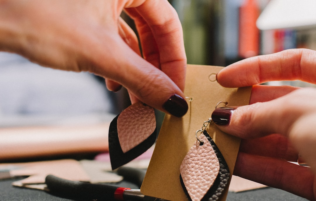 Hanging leather earrings into a jewelry card